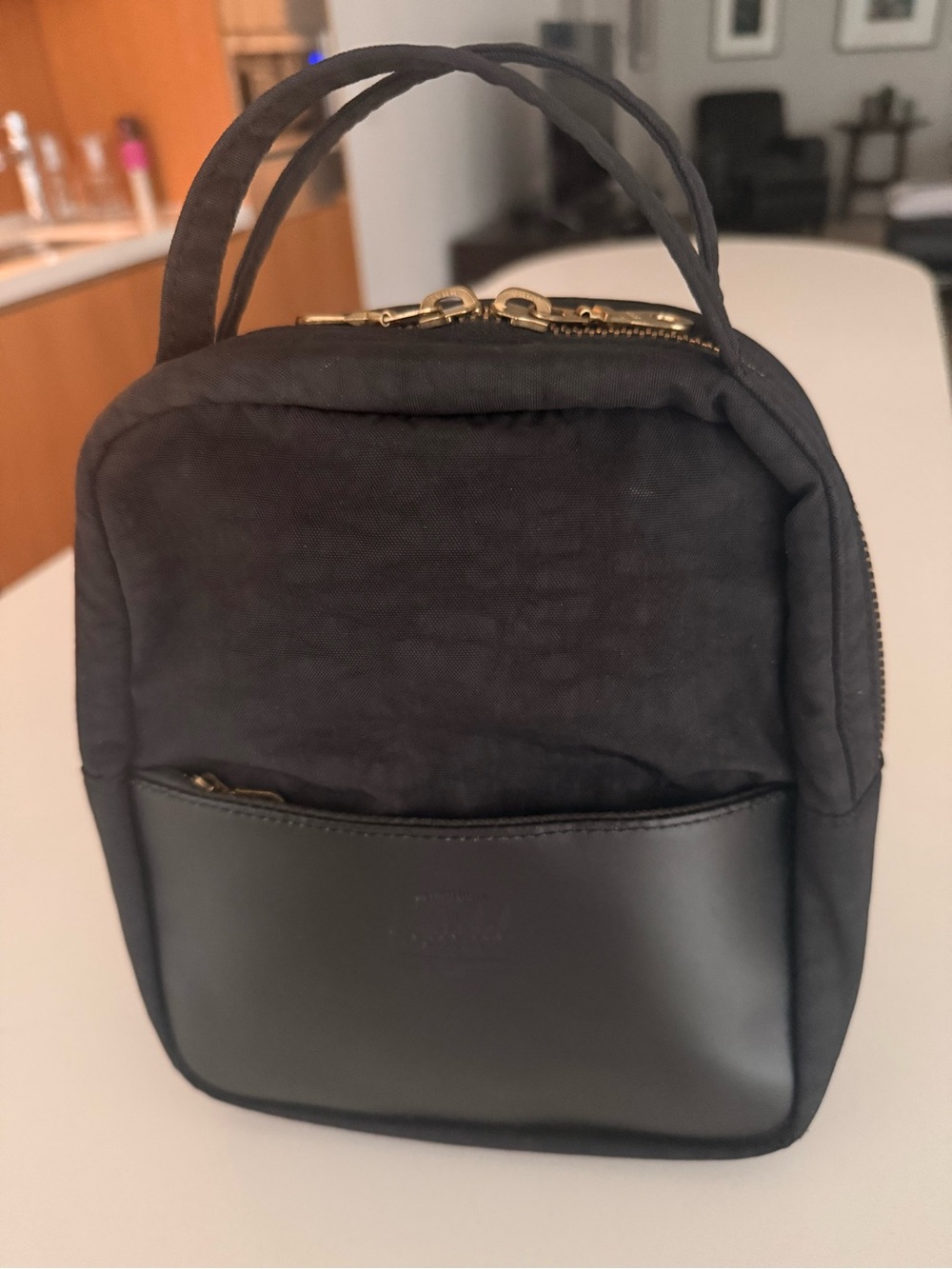 Herschel Orion Stylish Black Mini Backpack. Perfect for everyday use